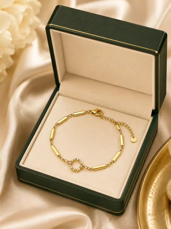 Aurelia anti-tarnish gold bracelet with crystal halo centre presented in a premium jewellery box
