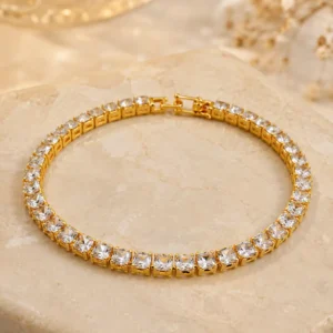 Anti-tarnish gold plated tennis bracelet with continuous square-cut CZ stones in claw settings