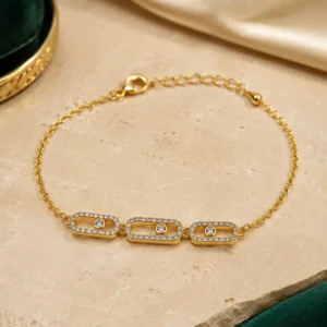 Aurelia gold-tone crystal link bracelet with three pavé rectangular links and central stones