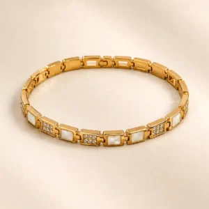 Anti-tarnish gold geometric link bracelet with alternating white inlays and crystal pavé squares