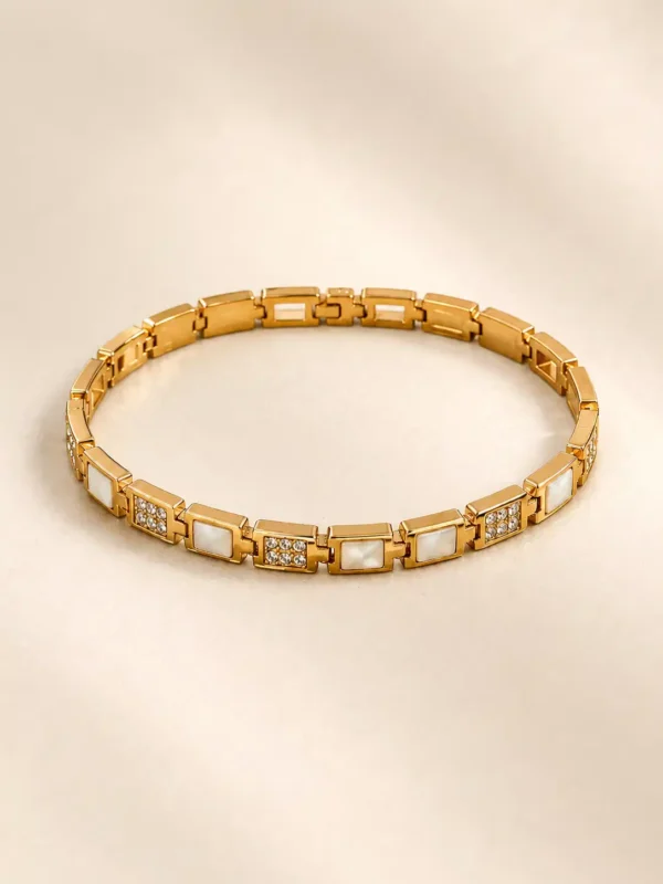 Anti-tarnish gold geometric link bracelet with alternating white inlays and crystal pavé squares