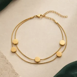 Golden Orbit anti-tarnish double-strand gold-toned disc bracelet with lobster clasp and adjustable extension chain