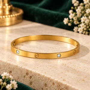 Anti-tarnish gold bangle for women with crystal stones and screw motifs