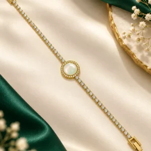 Anti-tarnish gold tennis bracelet with mother-of-pearl centre and clear cubic zirconia stones