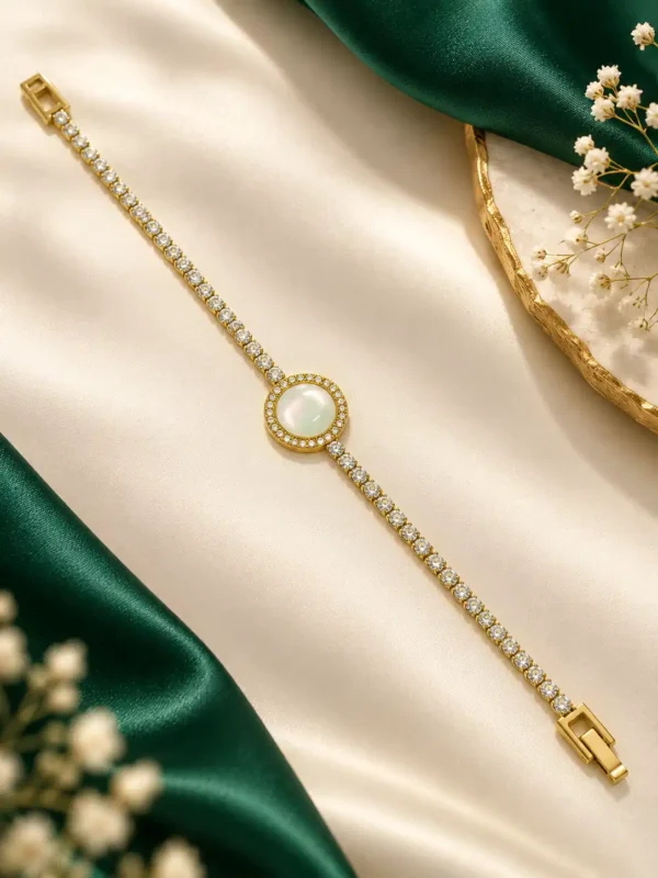 Anti-tarnish gold tennis bracelet with mother-of-pearl centre and clear cubic zirconia stones