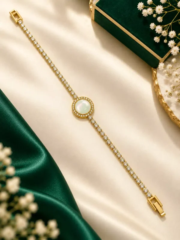 Anti-tarnish gold CZ tennis bracelet with pearl centre in jewellery presentation box