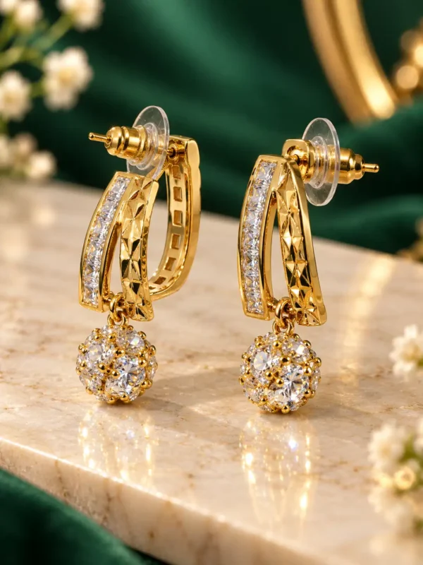 Side view of Elara anti-tarnish crystal drop earrings showing gold geometric setting and earring posts