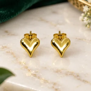 Amora anti-tarnish gold puffy heart stud earrings in a petite 1 cm design