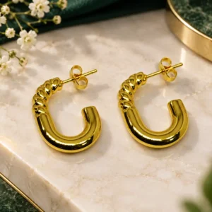 Sculpted Twist anti-tarnish gold hoop earrings with polished U-shape and twisted upper detail