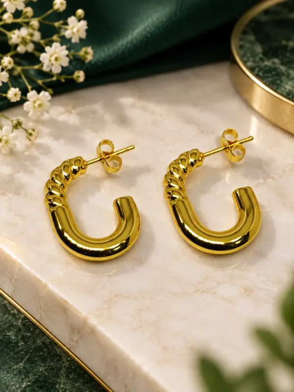 Sculpted Twist anti-tarnish gold hoop earrings with polished U-shape and twisted upper detail