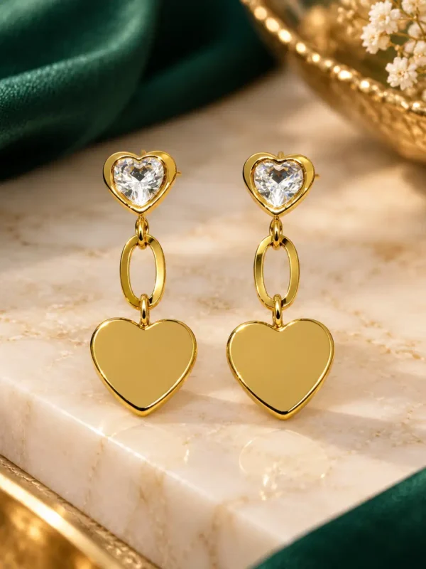 Anti-tarnish gold-plated heart drop earrings with sparkling heart-shaped CZ studs and polished heart charms