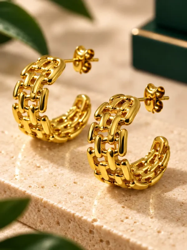 Aurelia anti-tarnish gold hoop earrings with a textured woven chain-link design