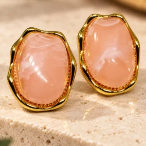 Blush Muse anti-tarnish pink gold stud earrings with sculpted irregular frames