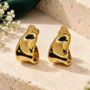 Amara anti-tarnish gold half hoop earrings with smooth molten sculptural design