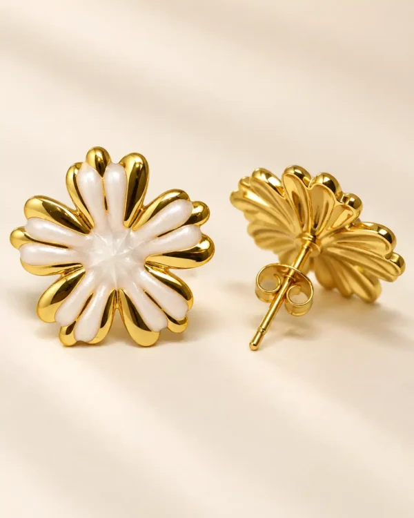 Front and back view of white and gold floral stud earrings showing post and push-back closure