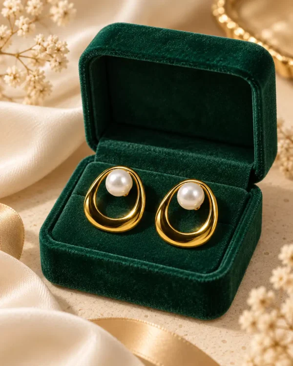 Elara Pearl Orbit earrings in green jewellery box with cream ribbon and floral styling