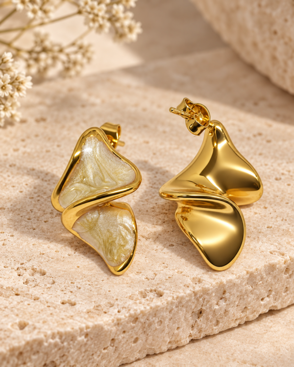 Aurelia Ripple stud earrings showing pearlescent front design and polished gold back with push-back post
