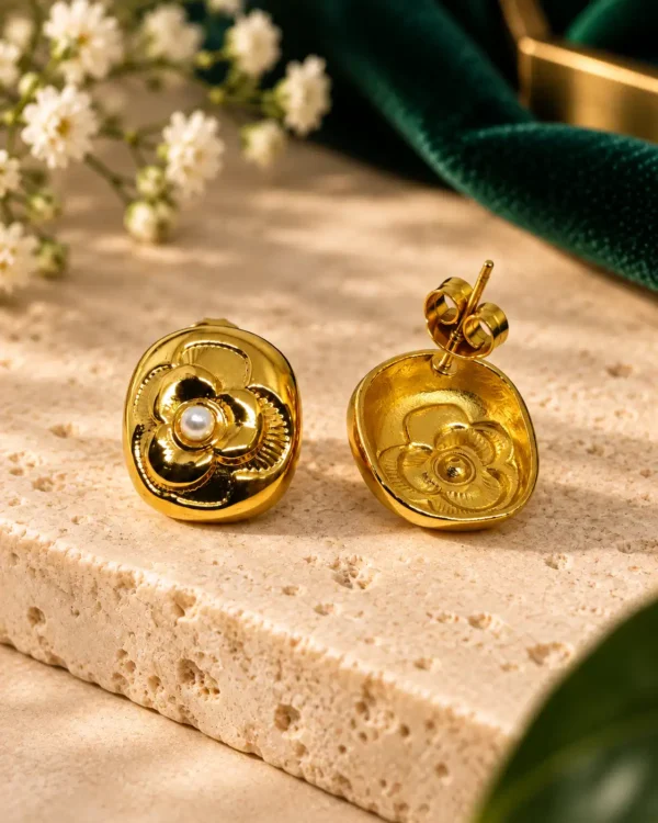 Front and back view of Camellia Pearl Bloom gold floral stud earrings showing pearl centre, post and push-back closure