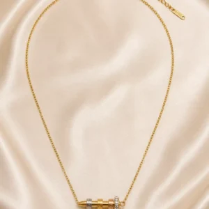 Veyra tri-tone nail pendant necklace with gold-tone chain, crystal detail, lobster clasp and extender