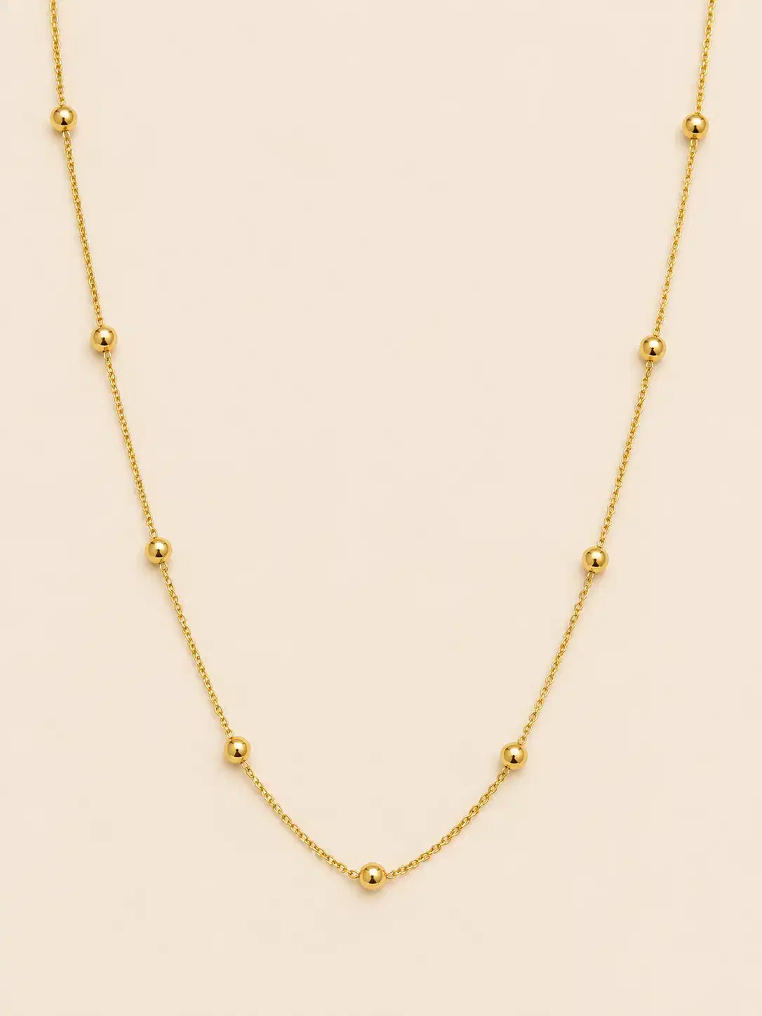 solene-gold-bead-station-necklace