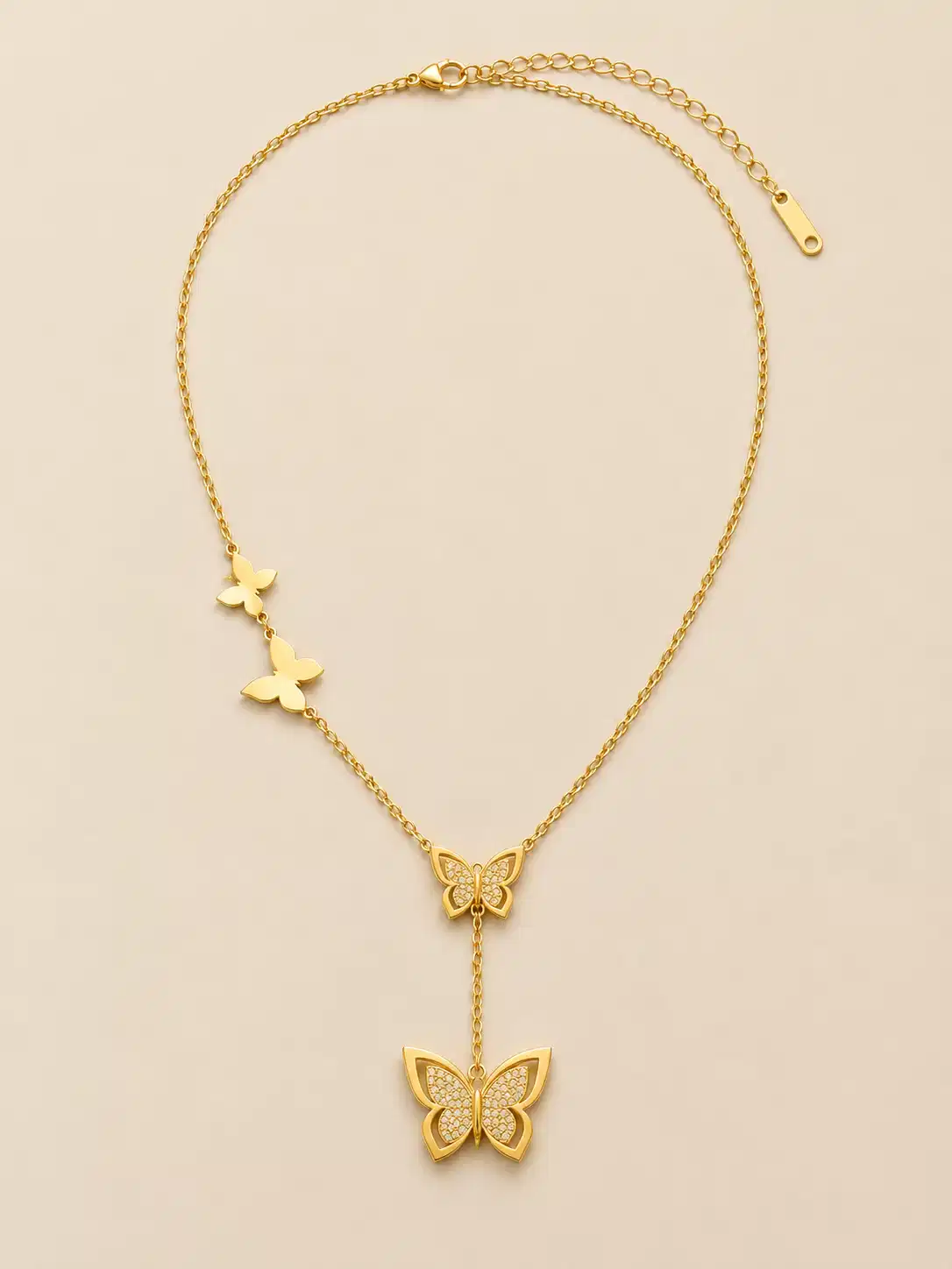 Full gold butterfly pendant necklace with asymmetric butterflies, drop pendant and extender chain