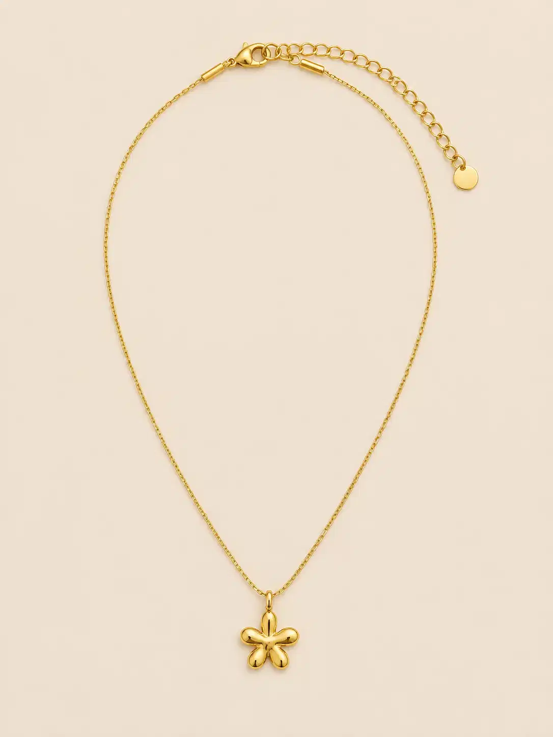 Full view of Aurelia Bloom gold floral pendant necklace with extension chain