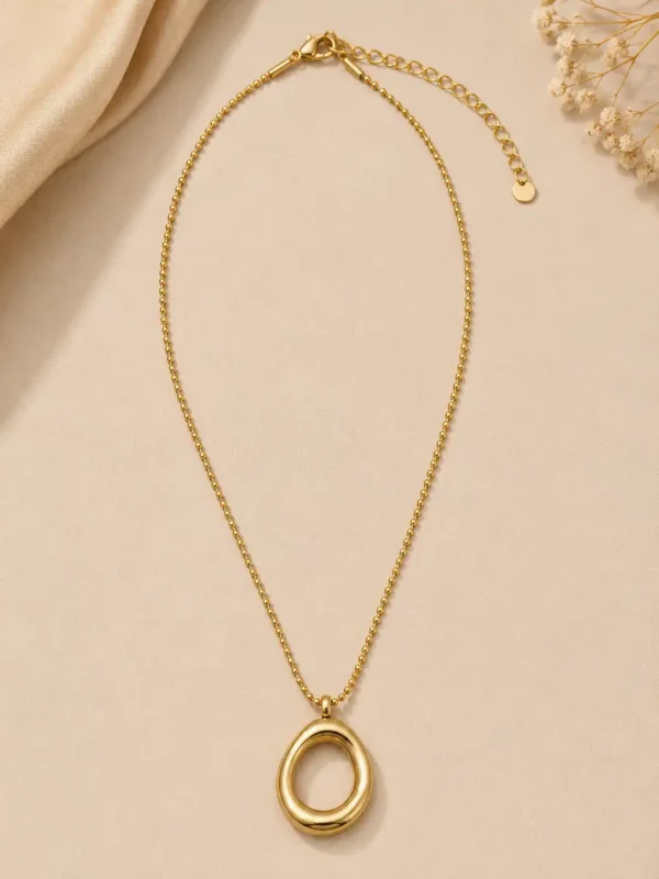 Full Elara Loop gold oval pendant necklace with ball chain and extender