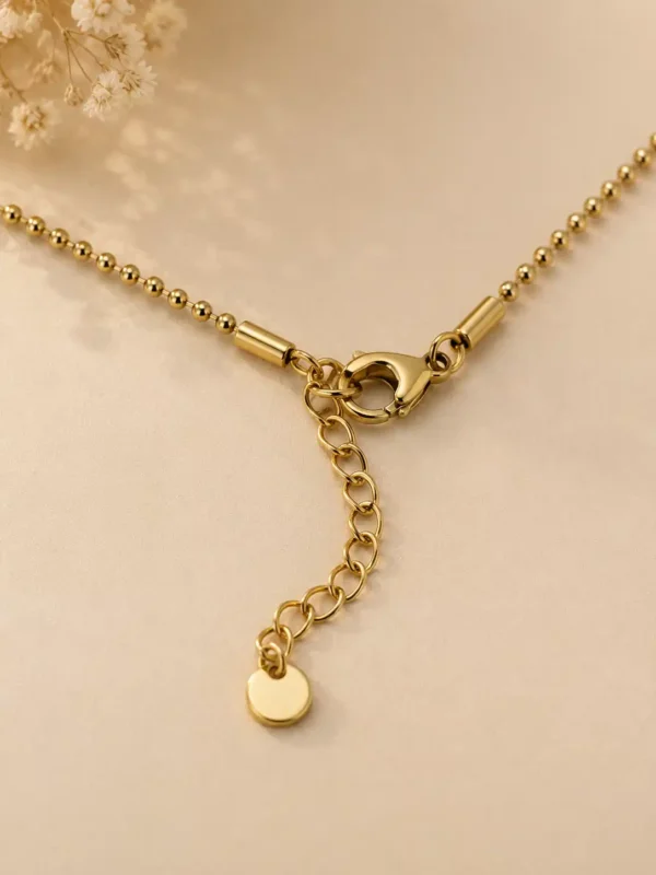 Elara Loop necklace lobster clasp and gold extension chain close-up