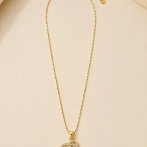 Muse anti-tarnish crystal silhouette pendant necklace for women with gold-tone chain, clear stones and adjustable extender