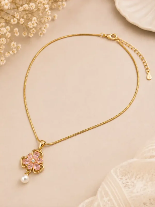 Full Rosé Bloom pink crystal flower pendant necklace with gold-tone chain, lobster clasp and extender