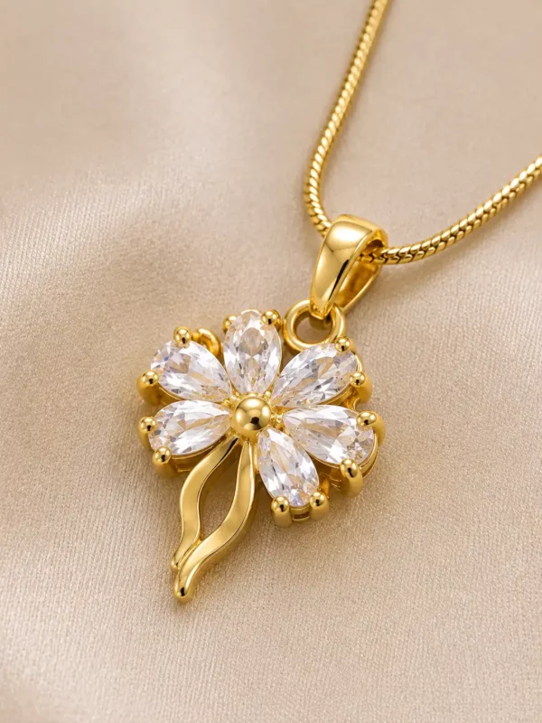 Close-up of clear marquise crystal flower pendant on Elara gold anti-tarnish layered necklace