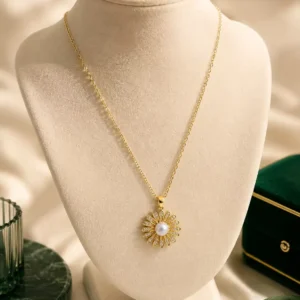 Aurelia gold plated pearl flower pendant necklace with crystal-studded petals