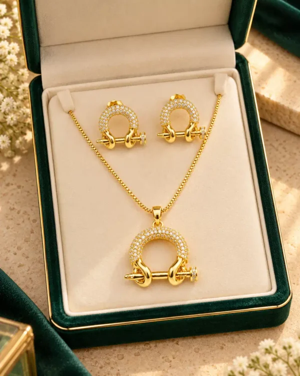 Aurelia crystal pendant necklace and matching stud earrings displayed in a green jewellery box