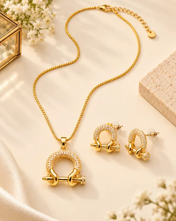 Full-length Aurelia gold crystal pendant necklace with matching earrings, lobster clasp and extender chain